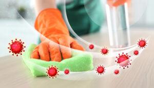 Reinigung gegen Viren mit Schwamm und Desinfektionslösung